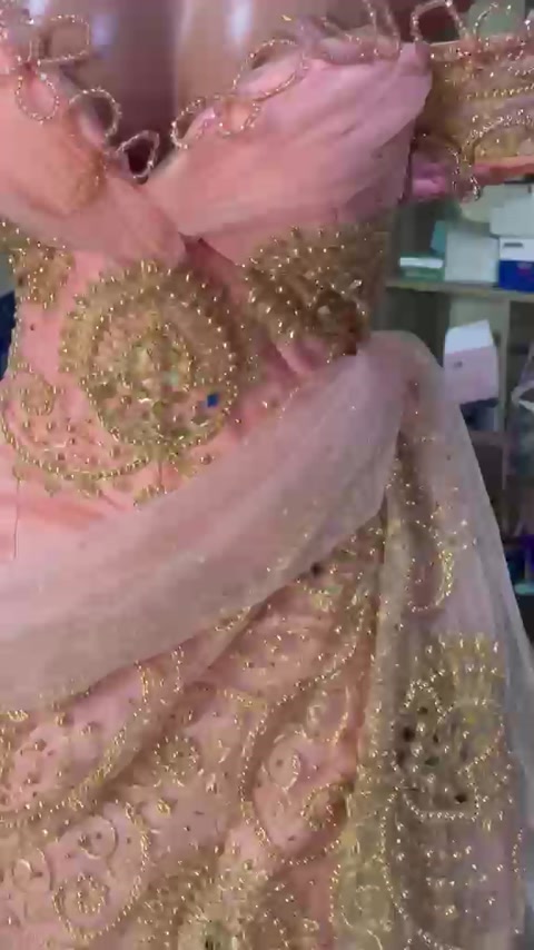 Pink and gold embellished occasion outfit.